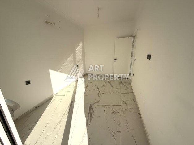 Квартира 1+1 в новом комплексе 2024 года в Махмутларе, 55 м², 700 метров до моря - Ракурс 7