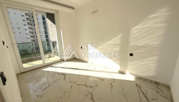 Квартира 1+1 в новом комплексе 2024 года в Махмутларе, 55 м², 700 метров до моря - Ракурс 9