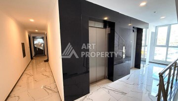 Квартира 1+1 в новом комплексе 2024 года в Махмутларе, 55 м², 700 метров до моря - Ракурс 10