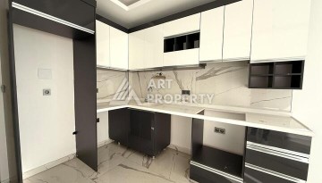 Квартира 1+1 в новом комплексе 2024 года в Махмутларе, 55 м², 700 метров до моря - Ракурс 11