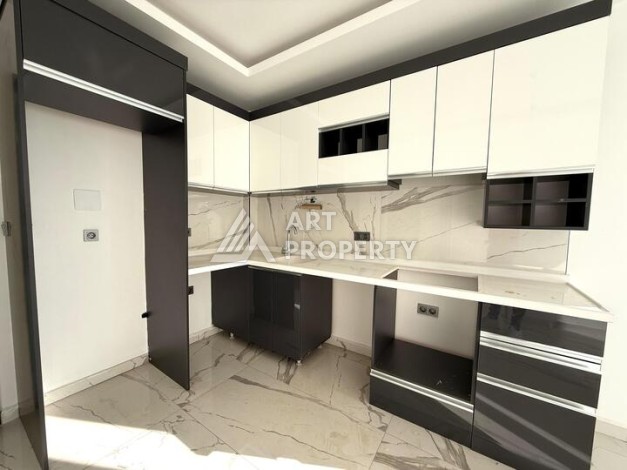 Квартира 1+1 в новом комплексе 2024 года в Махмутларе, 55 м², 700 метров до моря - Ракурс 10