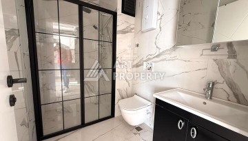 Квартира 1+1 в новом комплексе 2024 года в Махмутларе, 55 м², 700 метров до моря - Ракурс 12