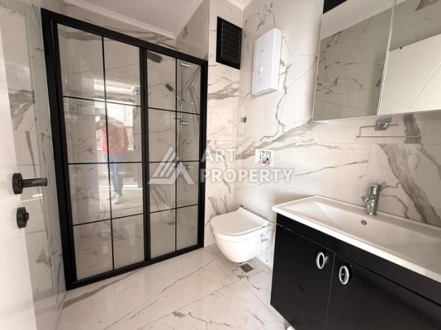 Квартира 1+1 в новом комплексе 2024 года в Махмутларе, 55 м², 700 метров до моря - Ракурс 11