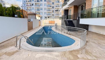 Квартира 1+1 в новом комплексе 2024 года в Махмутларе, 55 м², 700 метров до моря - Ракурс 15