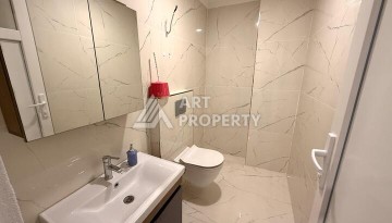 Квартира 1+1 в новом комплексе 2024 года в Махмутларе, 55 м², 700 метров до моря - Ракурс 16