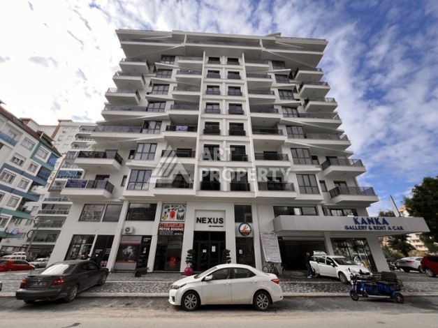 Квартира 1+1 с видом на море в Махмутларе, 57 м², дом 2025 года - Ракурс 0