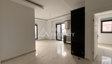 Квартира 1+1 с видом на море в Махмутларе, 57 м², дом 2025 года - Ракурс 2