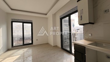 Квартира 1+1 с видом на море в Махмутларе, 57 м², дом 2025 года - Ракурс 4