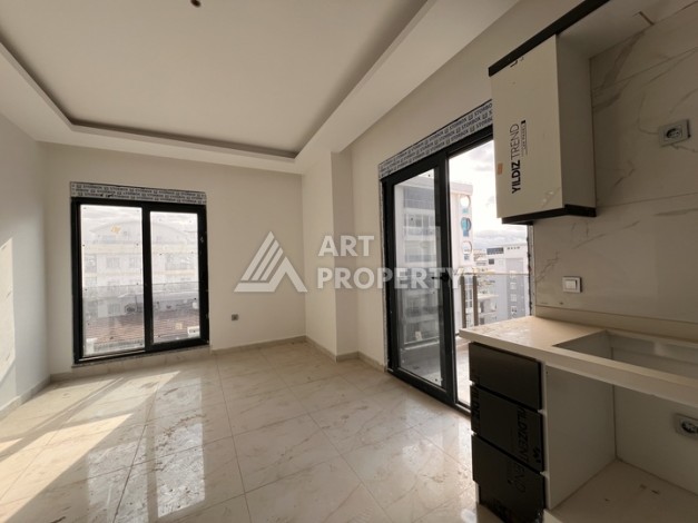 Квартира 1+1 с видом на море в Махмутларе, 57 м², дом 2025 года - Ракурс 3