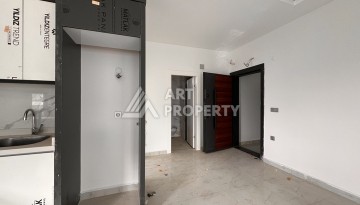 Квартира 1+1 с видом на море в Махмутларе, 57 м², дом 2025 года - Ракурс 5