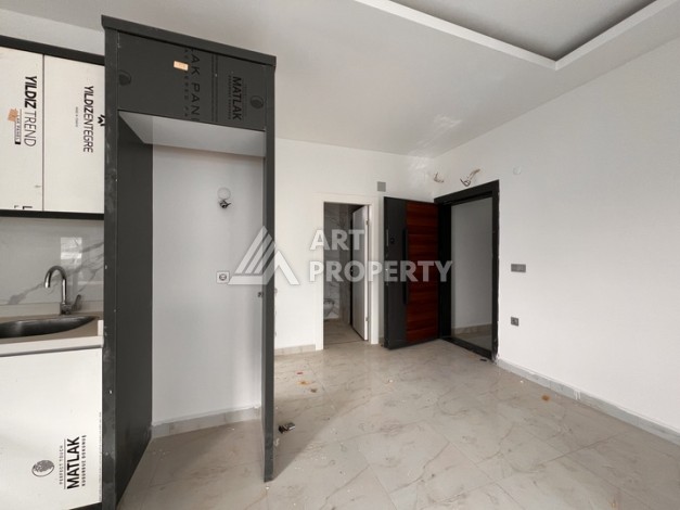 Квартира 1+1 с видом на море в Махмутларе, 57 м², дом 2025 года - Ракурс 4