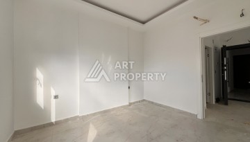 Квартира 1+1 с видом на море в Махмутларе, 57 м², дом 2025 года - Ракурс 6