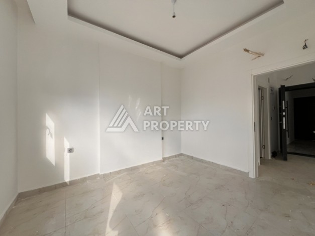 Квартира 1+1 с видом на море в Махмутларе, 57 м², дом 2025 года - Ракурс 5