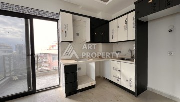 Квартира 1+1 с видом на море в Махмутларе, 57 м², дом 2025 года - Ракурс 7