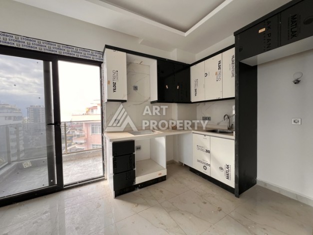 Квартира 1+1 с видом на море в Махмутларе, 57 м², дом 2025 года - Ракурс 6