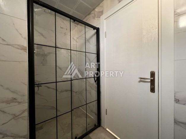 Квартира 1+1 с видом на море в Махмутларе, 57 м², дом 2025 года - Ракурс 8