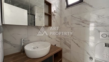 Квартира 1+1 с видом на море в Махмутларе, 57 м², дом 2025 года - Ракурс 11