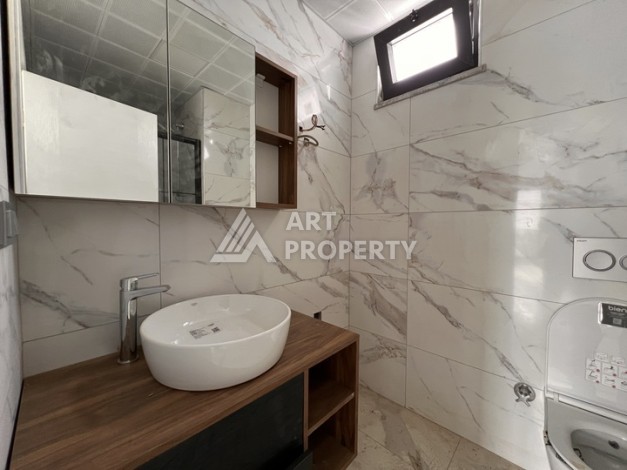 Квартира 1+1 с видом на море в Махмутларе, 57 м², дом 2025 года - Ракурс 10