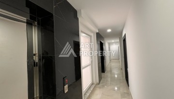 Квартира 1+1 с видом на море в Махмутларе, 57 м², дом 2025 года - Ракурс 12