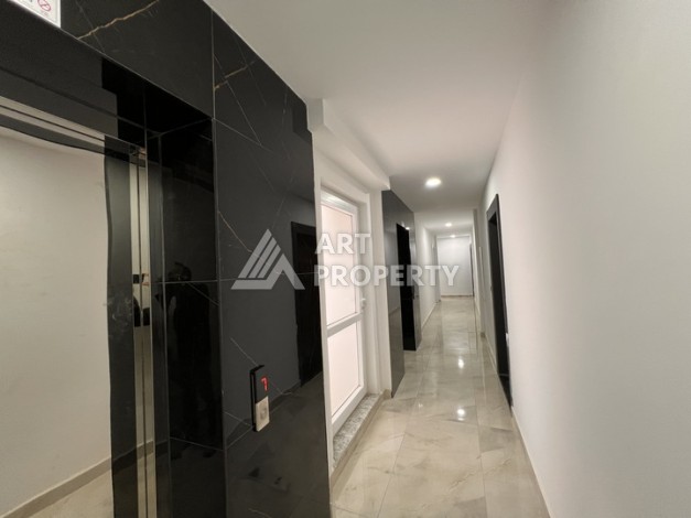 Квартира 1+1 с видом на море в Махмутларе, 57 м², дом 2025 года - Ракурс 11