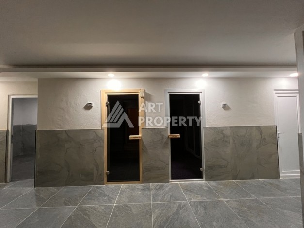 Квартира 1+1 с видом на море в Махмутларе, 57 м², дом 2025 года - Ракурс 12