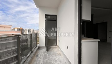 Квартира 1+1 с видом на море в Махмутларе, 57 м², дом 2025 года - Ракурс 15