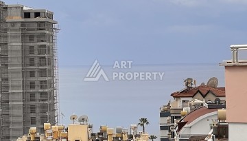 Квартира 1+1 с видом на море в Махмутларе, 57 м², дом 2025 года - Ракурс 18