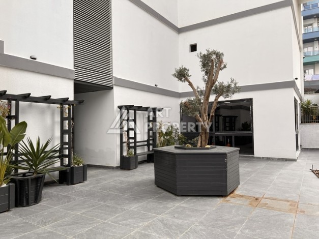 Квартира 1+1 с видом на море в Махмутларе, 57 м², дом 2025 года - Ракурс 19