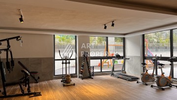 Квартира 1+1 с видом на море в Махмутларе, 57 м², дом 2025 года - Ракурс 21