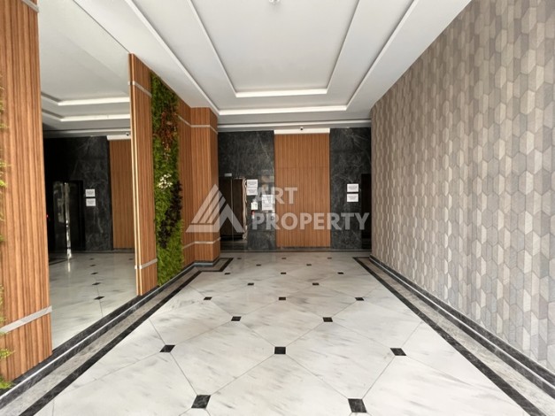 Квартира 1+1 с видом на море в Махмутларе, 57 м², дом 2025 года - Ракурс 22