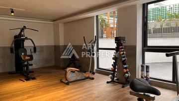 Квартира 1+1 с видом на море в Махмутларе, 57 м², дом 2025 года - Ракурс 24