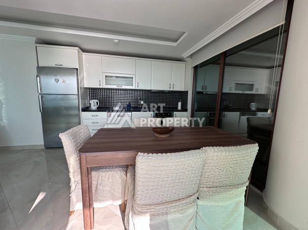 Квартира 2+1 на первой линии в районе Оба, 115 м², прямой вид на море и крепость - Ракурс 15