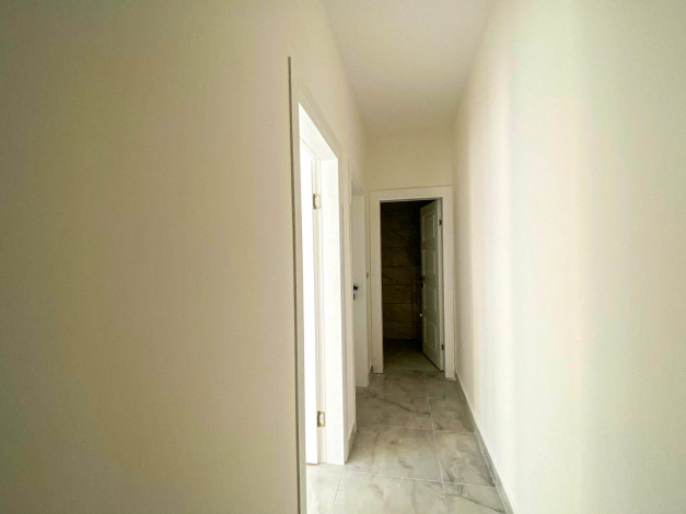 Трехкомнатная квартира в новом доме в 350 метрах от моря в Махмутлар, 110 м2 - Ракурс 6