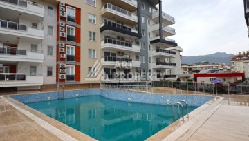 Современная квартира 1+1 в районе Тосмур — отличное решение для комфортной жизни у моря и выгодной инвестиции. - Ракурс 4