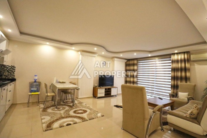 Современная квартира 1+1 в районе Тосмур — отличное решение для комфортной жизни у моря и выгодной инвестиции. - Ракурс 7