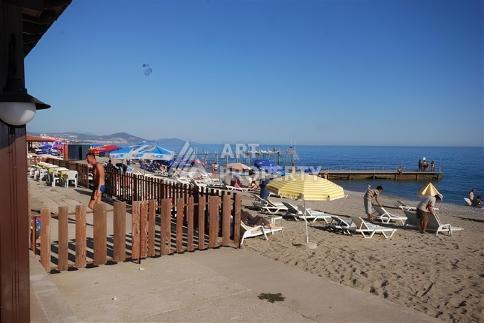 Апартаменты 3+1 в престижном жилом комплексе на первой береговой линии — отличное решение для комфортной жизни у моря. - Ракурс 3