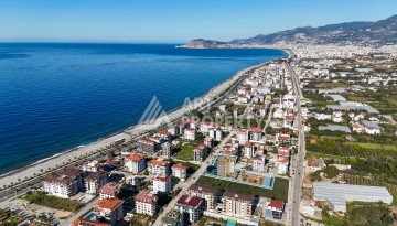 Квартиры 1+1 и дуплексы 2+1 и 3+1 в 200 метрах то моря в районе Кестель. - Ракурс 1