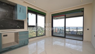 Современный дуплекс 2+1 с панорамным видом на море и бассейн — отличное предложение для комфортной жизни и отдыха. - Ракурс 3