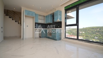 Современный дуплекс 2+1 с панорамным видом на море и бассейн — отличное предложение для комфортной жизни и отдыха. - Ракурс 14