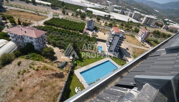 Современный дуплекс 2+1 с панорамным видом на море и бассейн — отличное предложение для комфортной жизни и отдыха. - Ракурс 15