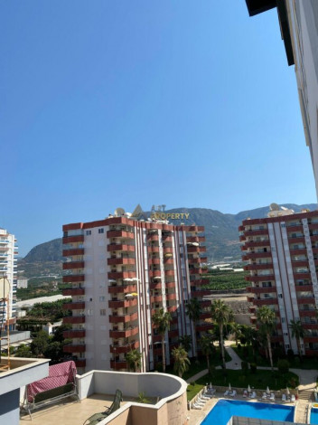 Трехкомнатная квартира в 500 метрах от Средиземного моря в районе Махмутлар, 115 м2 - Ракурс 5