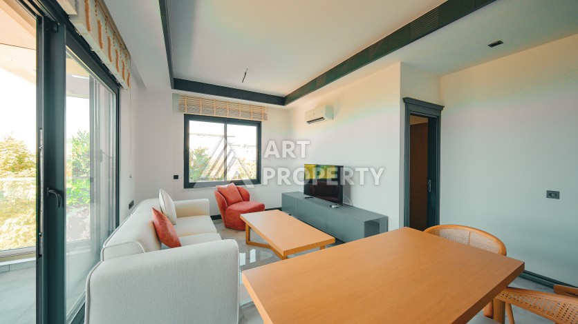 Апартаменты 1+1 в престижном районе Кестель, всего в 50 метрах от моря. - Ракурс 4