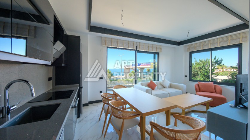 Апартаменты 1+1 в престижном районе Кестель, всего в 50 метрах от моря. - Ракурс 6