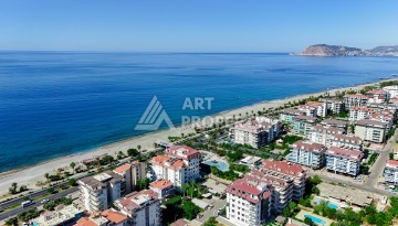 Апартаменты 1+1 в престижном районе Кестель, всего в 50 метрах от моря. - Ракурс 24