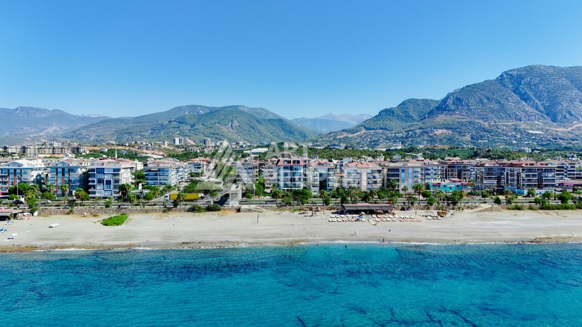 Апартаменты 1+1 в престижном районе Кестель, всего в 50 метрах от моря. - Ракурс 24