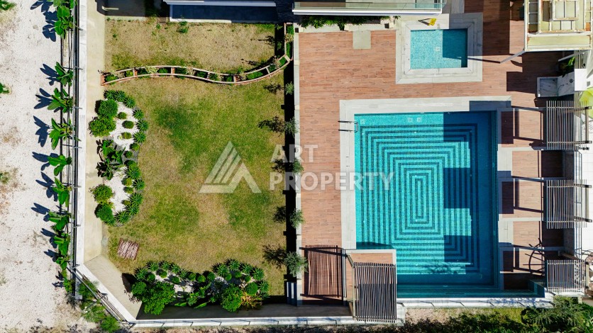 Апартаменты 1+1 в престижном районе Кестель, всего в 50 метрах от моря. - Ракурс 27