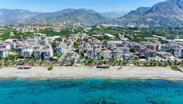 Апартаменты 1+1 в престижном районе Кестель, всего в 50 метрах от моря. - Ракурс 30