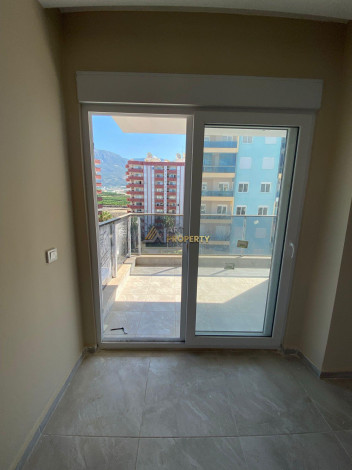 Трехкомнатная квартира в 500 метрах от Средиземного моря в районе Махмутлар, 115 м2 - Ракурс 9