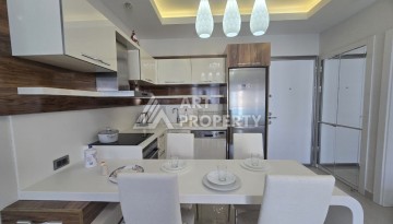 Апартаменты 1+1 в районе Махмутлар, всего в 150 метрах от моря. - Ракурс 7