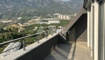 Двухуровневые апартаменты 2+1 с панорамным видом на море и крепость Алании. - Ракурс 2